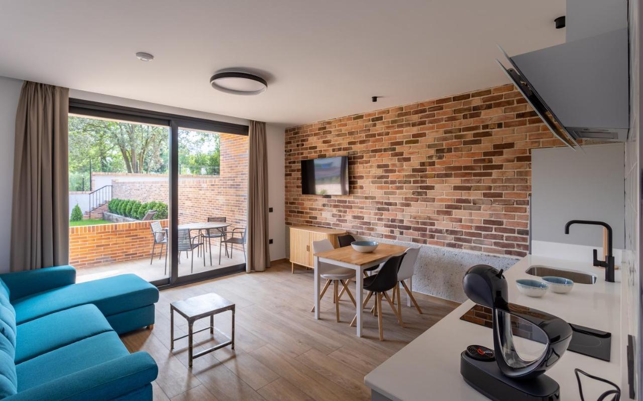 Alma Marina Apartamentos Сомо Экстерьер фото